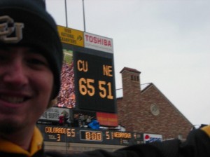 A happy camper celebrates the look of the scoreboard